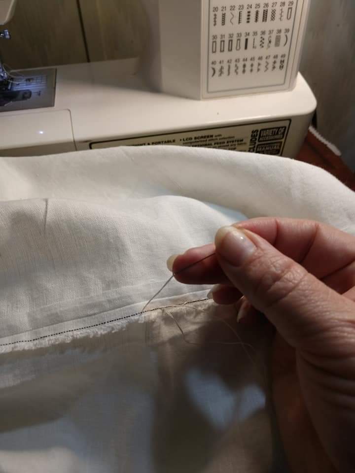 Seam opened up and stitched in place